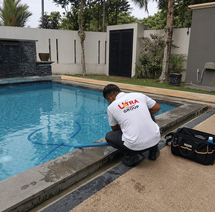 Ultra Group technician carrying out a free on-site pool assessment